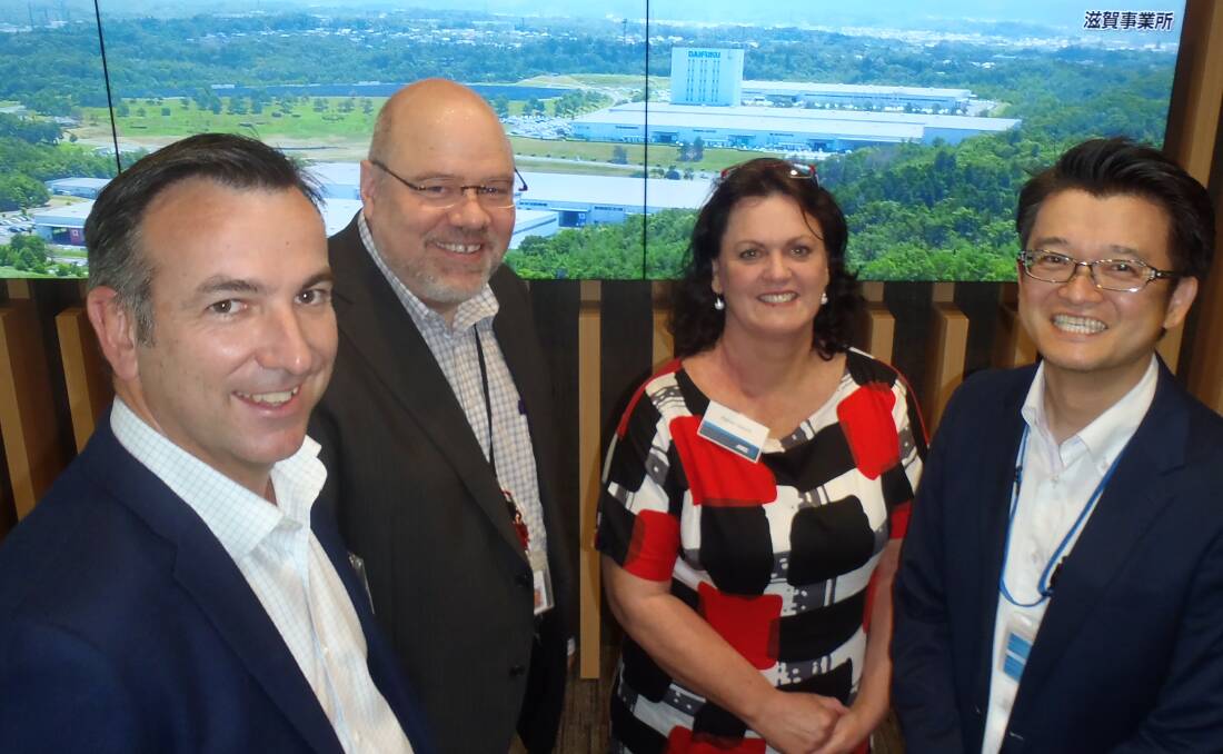 TECH SAVVY: ANZ's Victorian regional business banking head, Phil Crouch and Western Australian rural sector consultant, Maree Gooch, with Edward Ray and Ted Tanaka from robotic logistics company Daifuku, in Tokyo.
