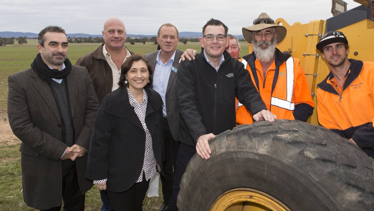 BIG PLANS: (L-R) Franck Woitez, managing director Neoen Australia, Nectar Farms managing director Stephen Sasse, Victorian Minister for Energy Lily D'Ambrosio, Northern Grampians mayor Tony Driscoll, Victorian Premier Daniel Andrews and the construction team at the site of the Bulgana wind farm. Photo: Peter Pickering
