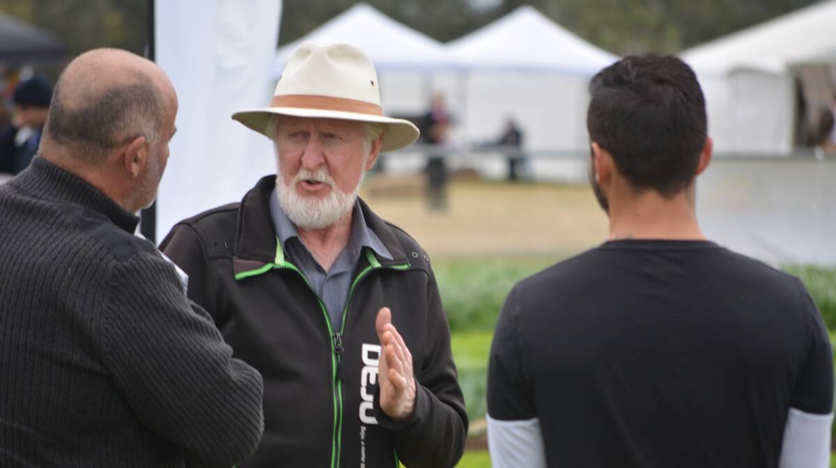 ON HAND: Bejo's John Pardew chats with visitors within the variety trial display at the 2016 National Horticultural and Innovation Expo at Gatton last month.