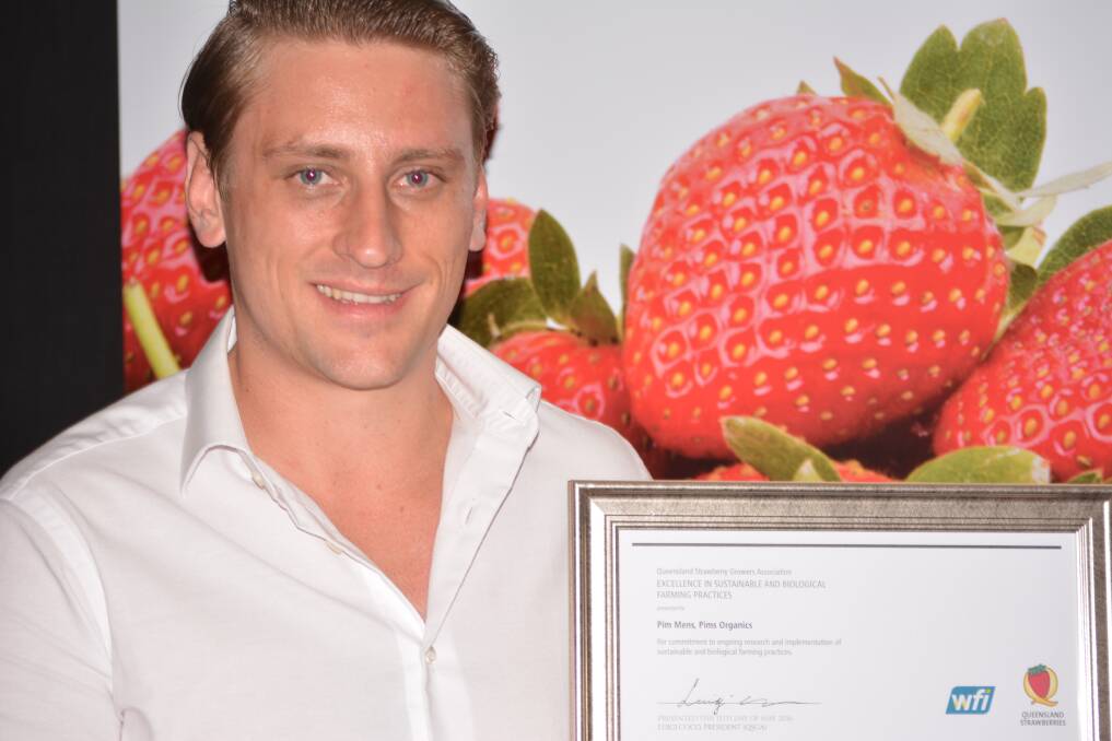 TOP GUN: Nathan Baronio of Eastern Colour, Stanthorpe, accepts his Young Gun Award at the Queensland Strawberry Growers Association dinner held on the Sunshine Coast.
