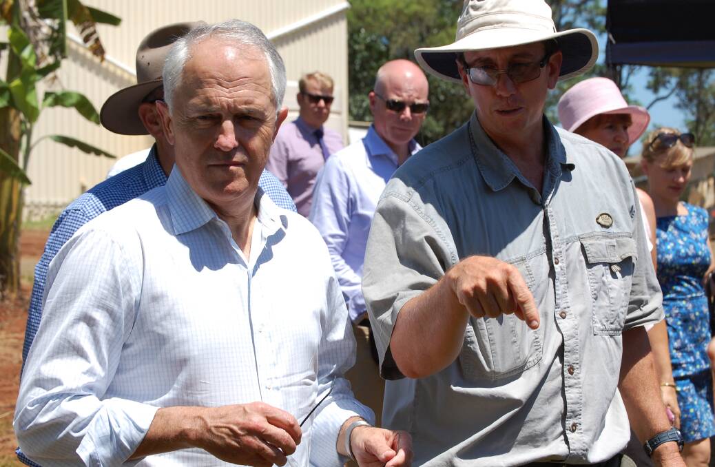 ON FARM: Prime Minister Malcolm Turnbull hears from orchardist Craig Van Rooyen about the potential for horticulture production in the Bundaberg region. 