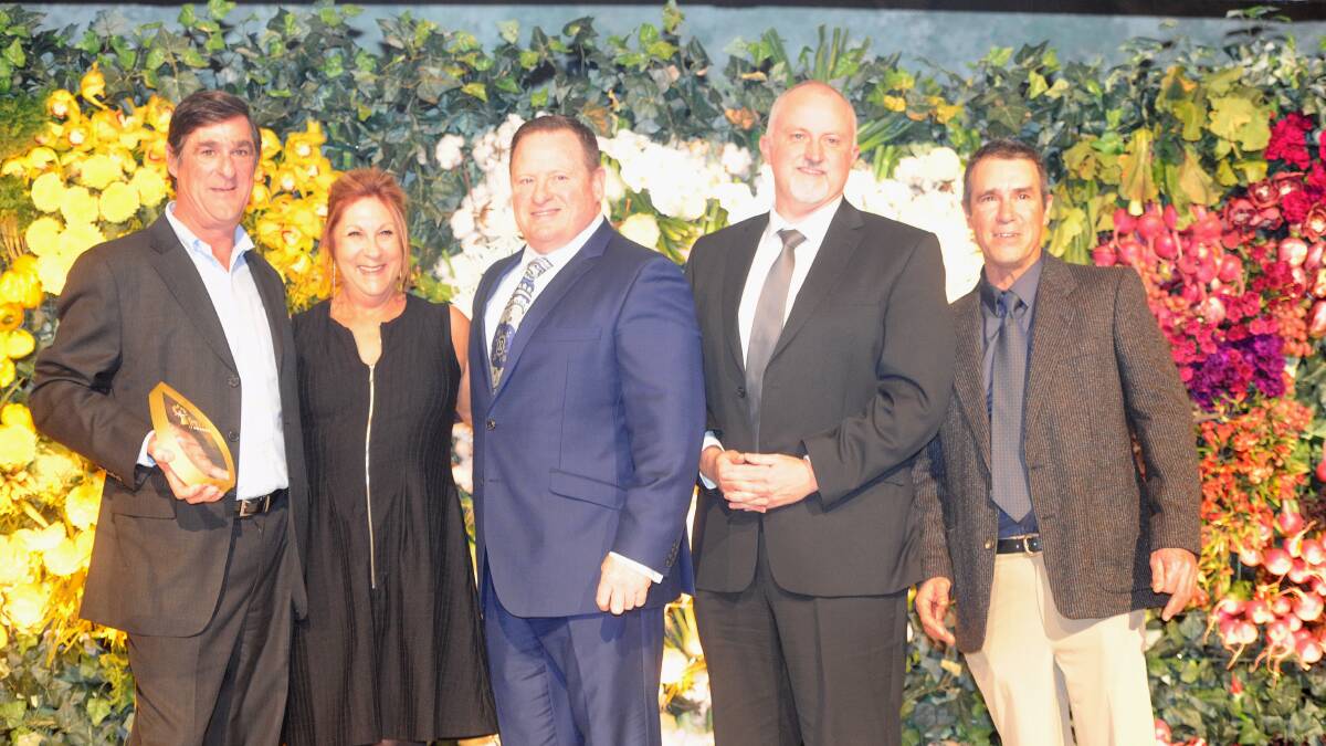 FULL BLOOM: S & P Dominello win the Flower Grower of the Year Award. Pictured are Sam Dominello, Vicki Dominello, Sydney Markets CEO Brad Latham, Toyota Material Handling's Mal Paterson and Phil Dominello.