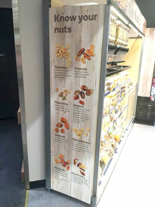 SALE POINT: A Woolworths' nut section with the information panel on the side to give customers as much information for their selection as possible. 
