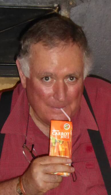 DRINK UP: Vito Rugani tucks into some carrot juice.
