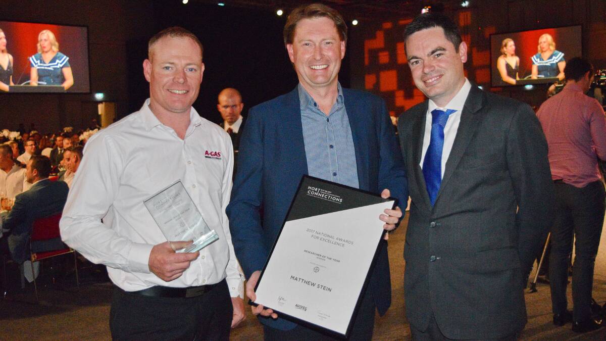 AWARD WINNER: A-Gas Rural operations manager, Ben Dewit, general manager Matt Stein and Bayer Horticulture grower and channel services marketing manager Peter Sullivan, presenting the Researcher of the Year award for research into new soil fumigation technologies at the Hort Connections National Awards of Excellence gala dinner in Adelaide.