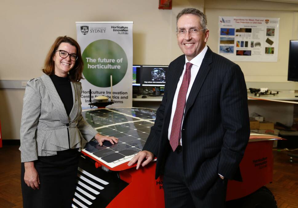 ROBOTS WELCOME: Assistant minister for agriculture Anne Ruston and Horticulture Innovation Australia chief executive John Lloyd at the opening of the new Horticulture Innovation Centre for Robotics and Intelligent Systems at the University of Sydney today.