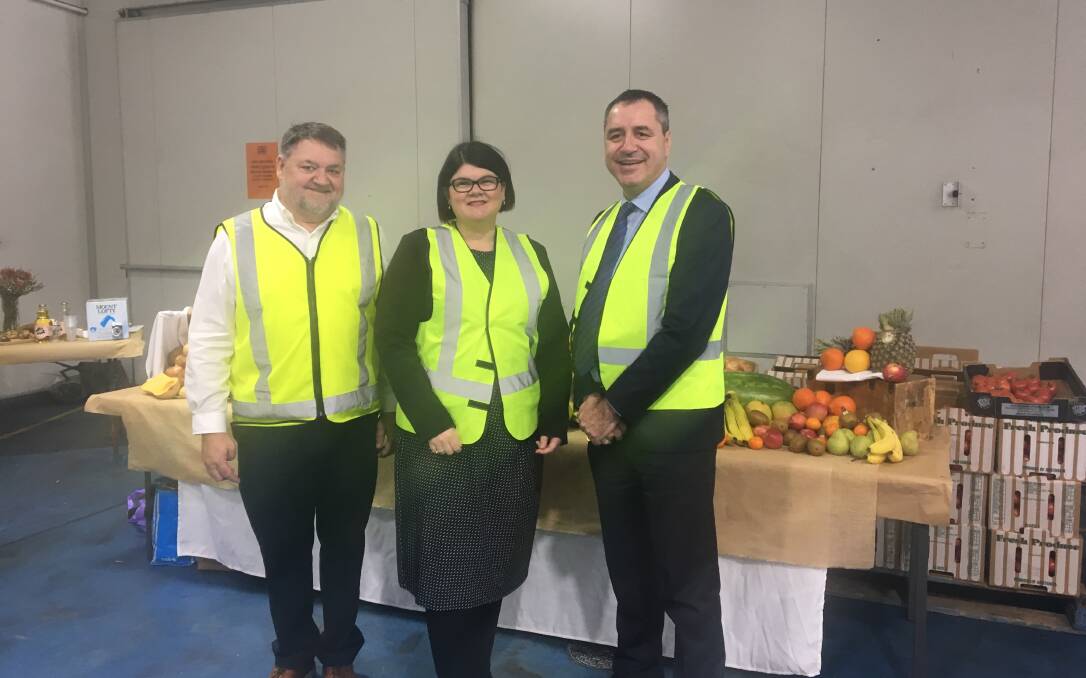 BIG GIVING: Foodbank SA general manager, Leigh Royans, with SA minister for communities and social inclusion, Zoe Bettison, and SA Produce Markets CEO Angelo Demasi. 