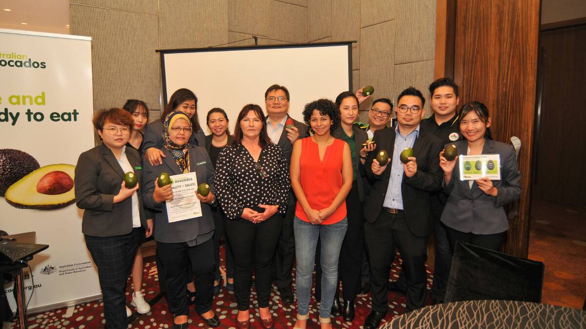 ALL IN: The Euro-Atlantic team from Malaysia with Western Australian avocado exporter Jennie Franceschi and nutritionist Alexandra Prabaharan (centre front) at a recent event in Malaysia.
