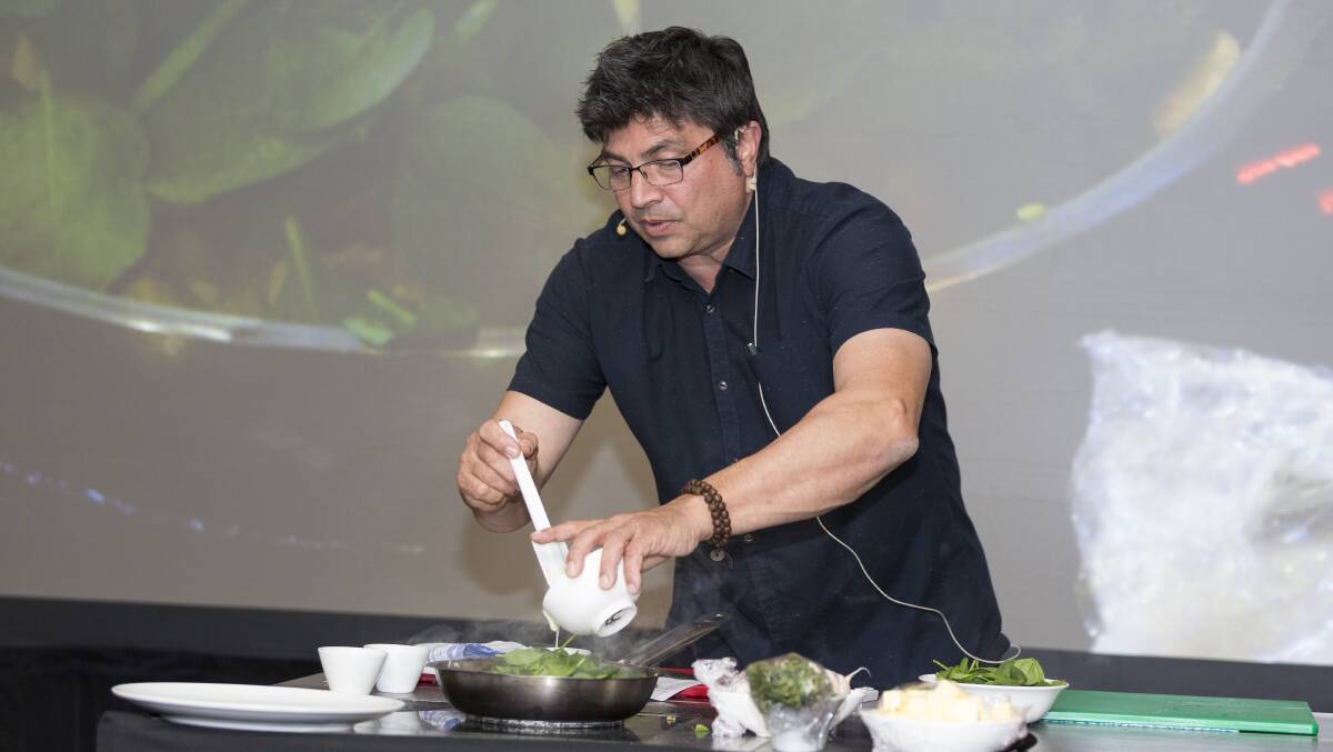 COOK UP: Celebrity chef, Geoff Jansz, cooks up a storm during a demonstration at the Women in Horticulture event, using locally grown vegetables. 