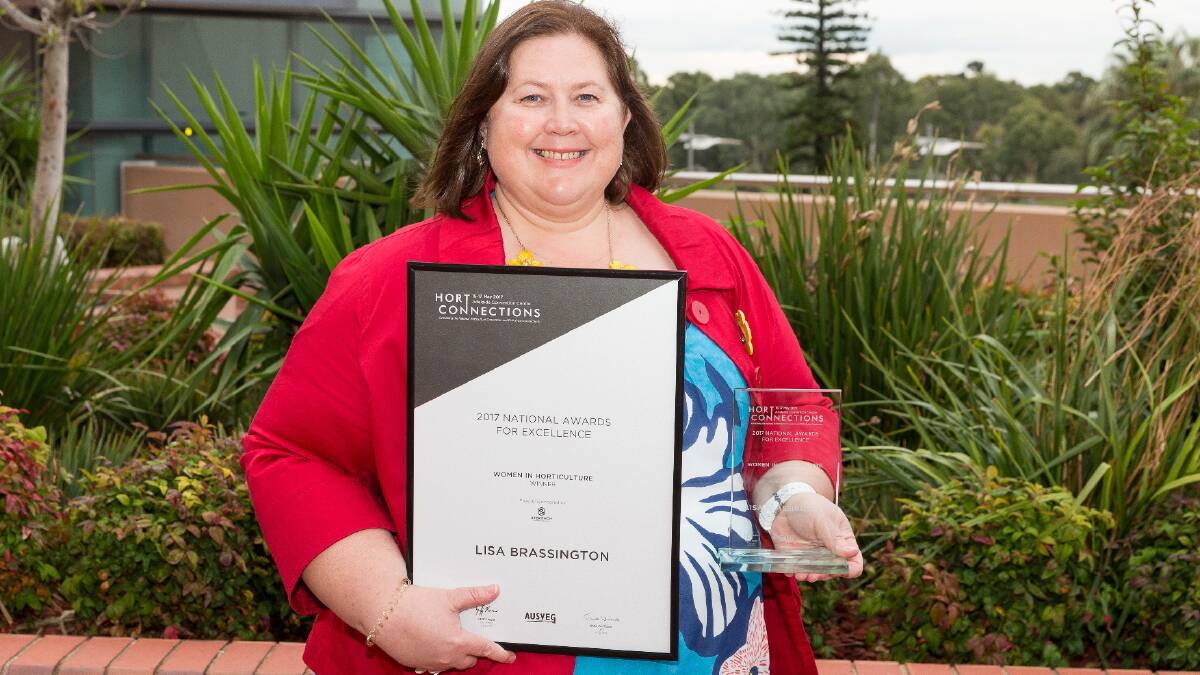 Lisa Brassington of Peninsula Fresh Organics in Victoria with her Women in Horticulture award in recognition of her passion for promoting the diverse role of women in the industry and her ongoing contribution to the organic sector.