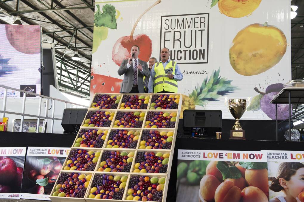 TOP DOLLAR: Last year's inaugural Summer Fruit Auction at the Sydney Markets raised more than $75,000 for selected charities.