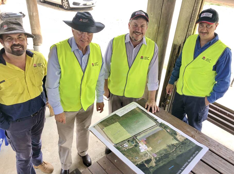 PLAN PREP: Greater Sydney Local Land Services' Peter Conasch, chairman Richard Bull, general manager David hogan and manager Paul Bennett, look over the plans for the new River Farm demonstration site to be built at Hawkesbury.
