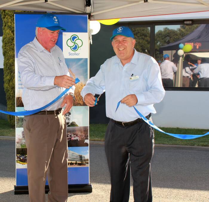 OPEN UP: Port Adelaide mayor, Gary Johanson (right) officially opens the Largs Bay facility, assisted by Stoller Australia general manager, Richard Emery. 