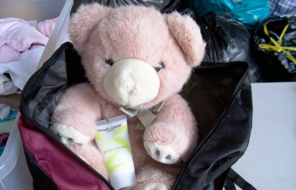 Backpacks include essential items such as toys and toiletries.