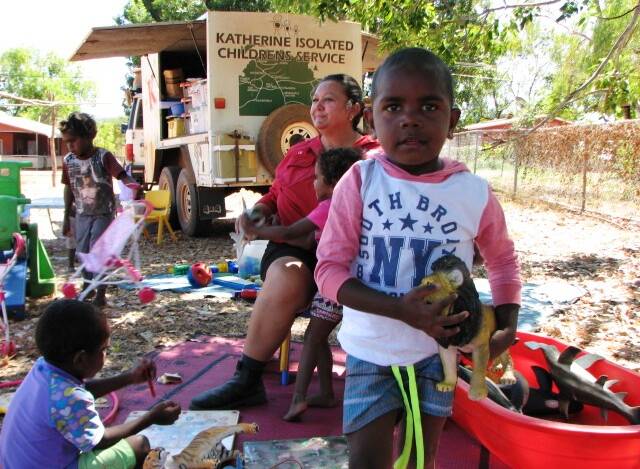 Children from Urapunga play with the toys from the Katherine Isolated Children's Service mobile play group.