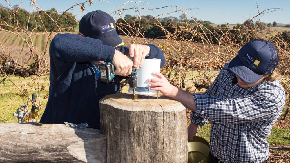 GETTING WIRED: Installation of a rain gauge that connects to a narrowband network.