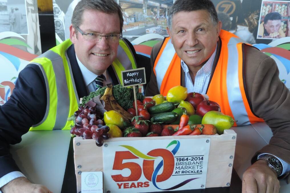 Queensland Agriculture Minister John McVeigh celebrates 50 years of operation at Rocklea with Brisbane Markets chairman Tony Joseph.
