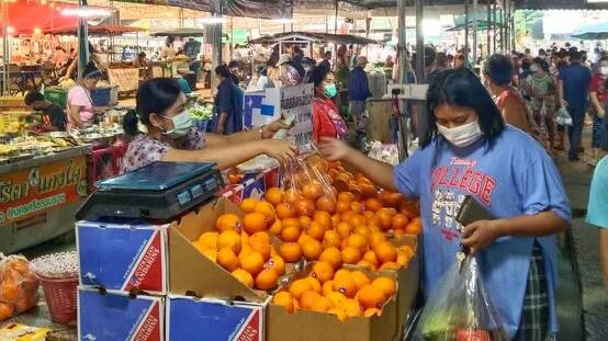 Matt and Rachael Benham find their fruit in Thai street markets. Picture by Rachel Benham