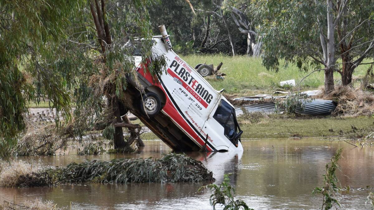 One of the many vehicles swept away during a flash flood in the town of Eugowra, Central West New South Wales, Tuesday, November 15, 2022. Picture by Murray McCloskey, AAP