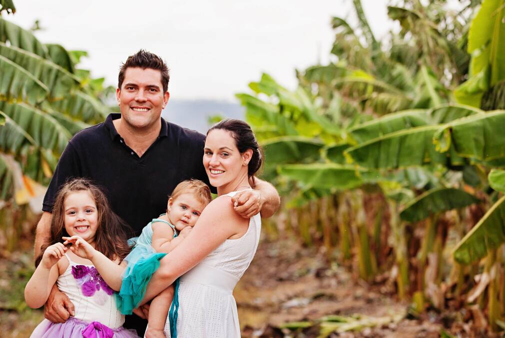 ON FARM: Rob and Krista Watkins with daughters, Kate and Kira.