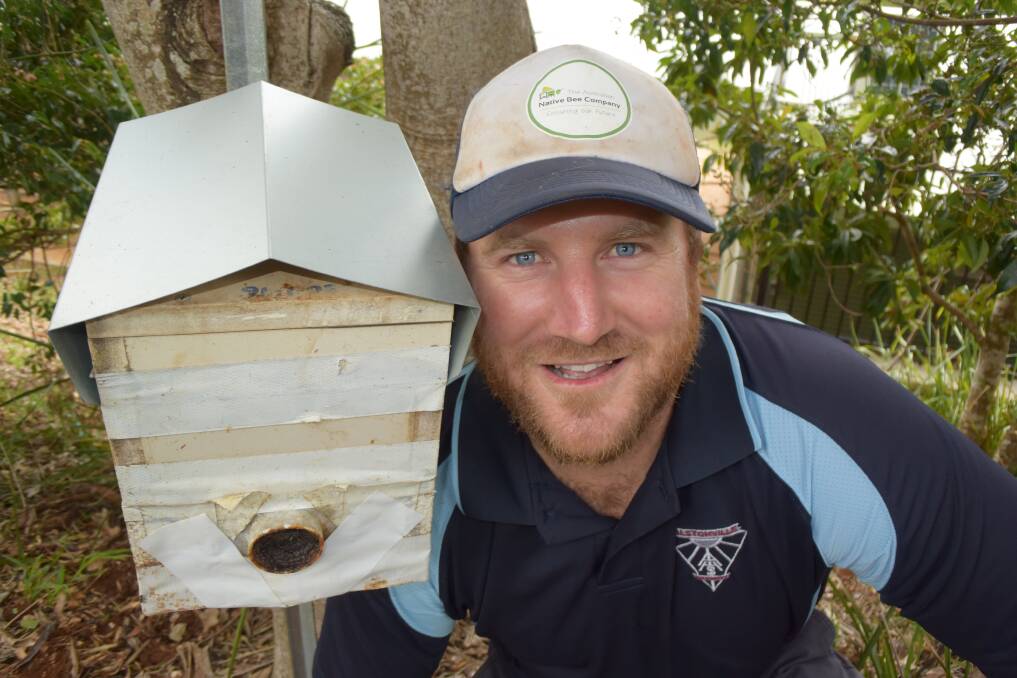 SWEET ATTRACTION: In an Australian-first, next year's HSC students can do a Certificate III in Beekeeping as a school-based traineeship. Alstonville High teacher and apiarist Steve Maginnity backs the initiative. Photo by Jamie Brown. 