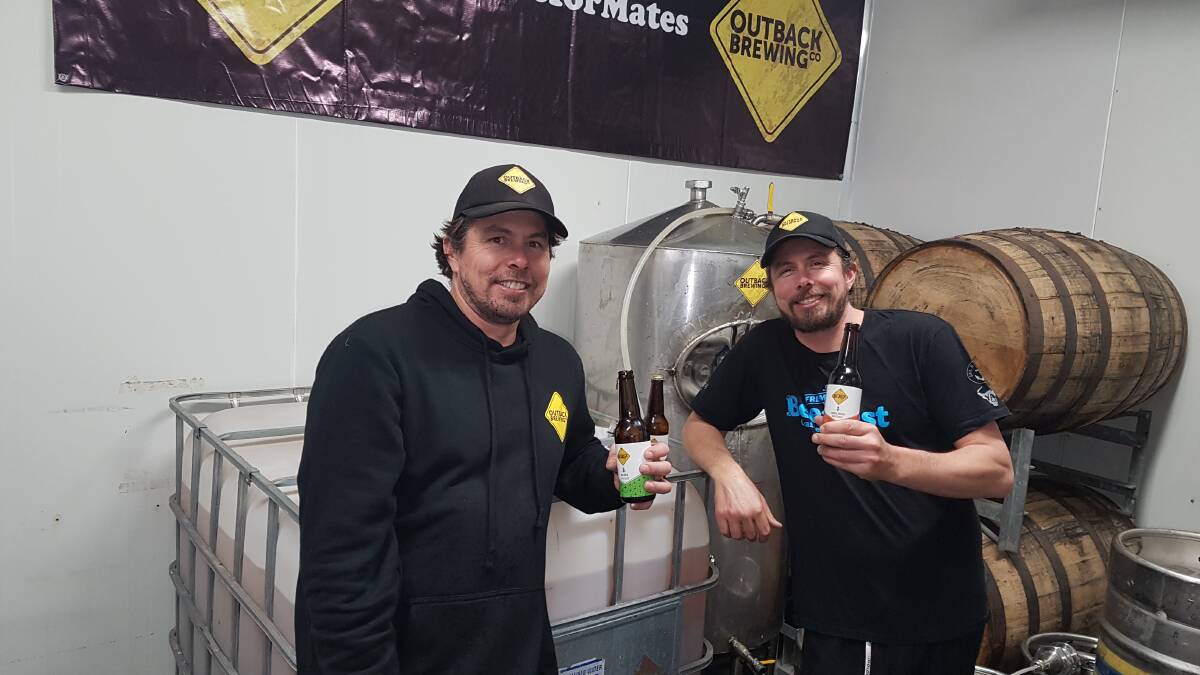 BREW TWO: Twins Adam Watts (left) and brother Peter relax with a beer in the microbrewery they built in the Lower Chittering Valley. They have built Adam's home brewing hobby into a growing part-time business, Outback Brewing Co.