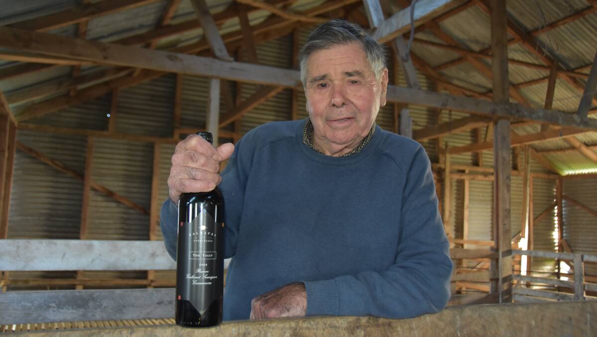 TOP: Doug Balnaves with a bottle of the family's top drop, the Tally Reserve Cabernet Sauvignon, which is a nod to his early years as a shearer.