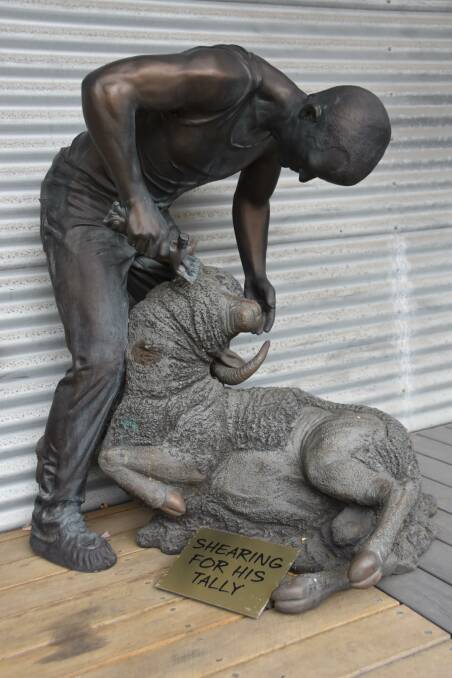 HISTORY: A bronzed statue of a shearer and a sheep at the cellar door pays homage to the Banaves family's beginnings in the sheep industry. 