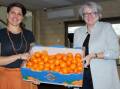 Elizabeth Brennan (left) and Sue Middleton promoting Moora Citrus and Northern Valley Packers. File picture
