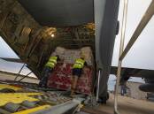 Emergency food aid on the way to Tonga last week to help in the recovery of the volcanic devastation. Picture: RAAF.