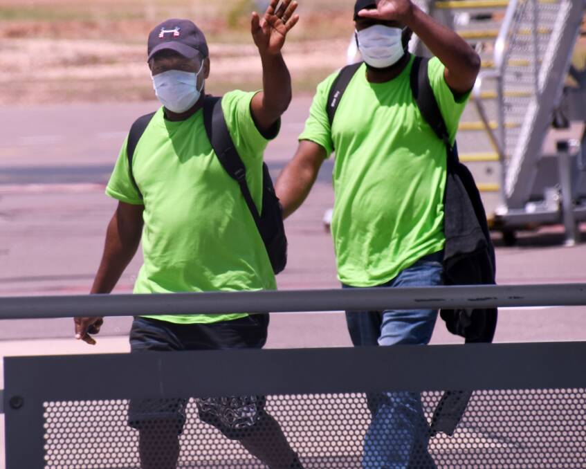 READY: A second planeload of fruit pickers from Vanuatu arrived in Darwin but to the disgust of growers headed to quarantine for two weeks even though the harvest has started.
