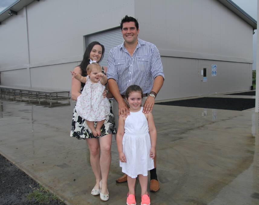 FAMILY PRIDE: Krista Watkins, husband Rob and their daughters Kira and Kate, pictured outside their Natural Evolution factory at Walkamin on the Atherton Tablelands. Photo: Lea Coglan