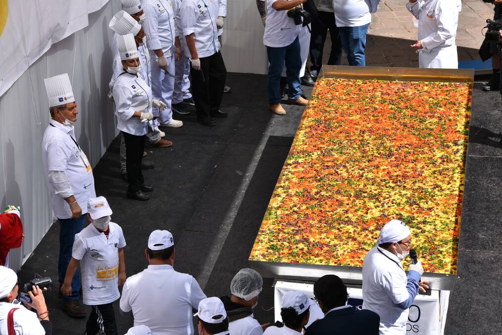 WORLD BEATER: The world's largest ever causa rellena, a traditional Peruvian dish involving lots of potatoes. This sucker weighed in at 590kg. 