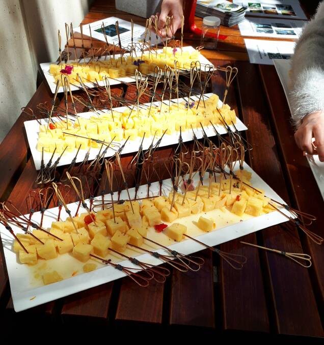 EAT UP: Part of the launch included native honey on cheese served to guests. 