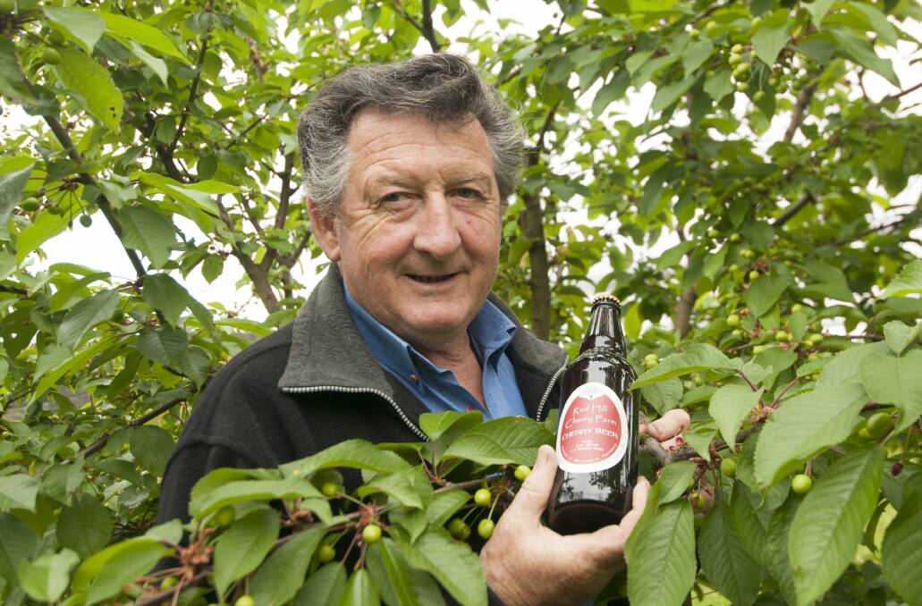 VALUE ADD: Victorian cherry grower, Trevor Holmes, with Red Hill Cherry Farm beer made from surplus cherries grown on his family’s Mornington Peninsula property. 