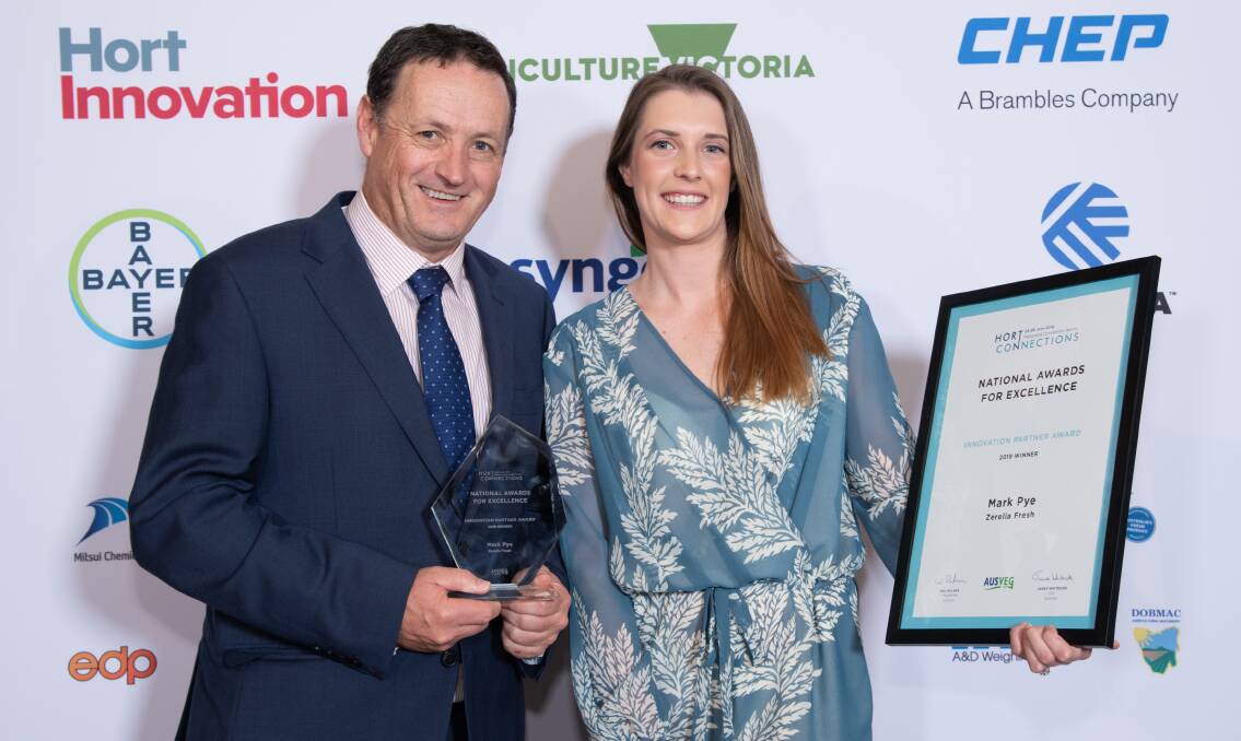 WINNING: Ausveg CEO James Whiteside and Renee Pye accepting the Innovation Partner Award on behalf of her father, Mark Pye, SA, at the Hort Connections Awards for Excellence in Melbourne this year. 