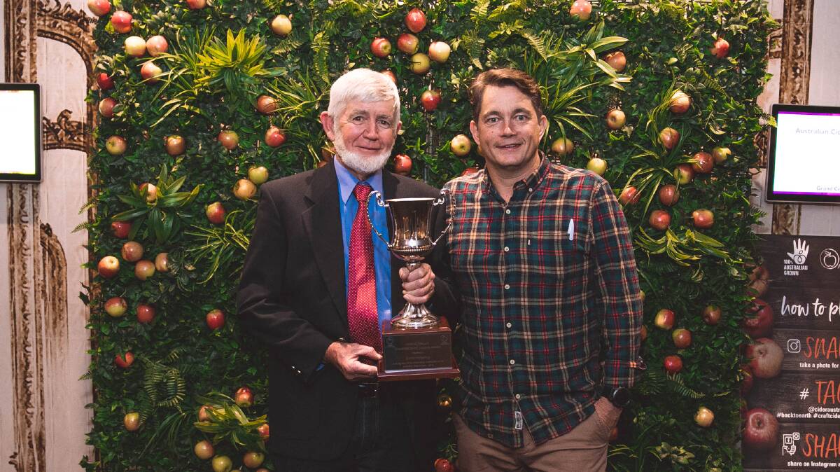 CHAMPION: David Pickering with his Champion of the Industry Award and Cider Australia president, Sam Reid.