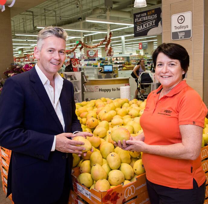 DONE DEAL: Coles managing director John Durkan and Manbulloo Mangoes founder Marie Piccone discuss the farm expansion plans.