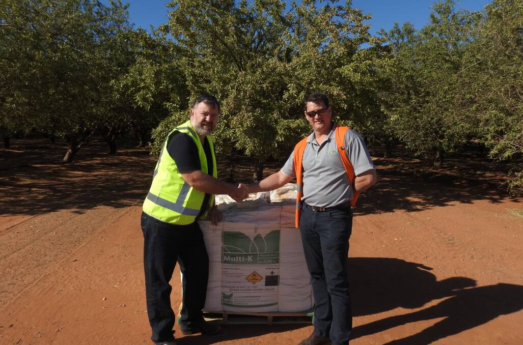 ON BOARD: Stephen Richards (right), Farm Waste Recovery (FWR), welcomes Haifa Australia managing director Trevor Dennis and the company to FWR’s stewardship program and recycling of fertiliser packaging.