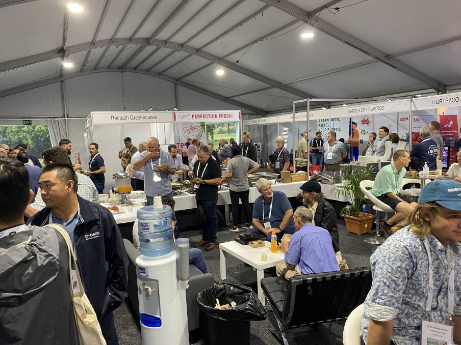 INFORMATION: A bustling trade show area giving opportunities for connections among growers, researchers, product representatives and other industry stakeholders. 