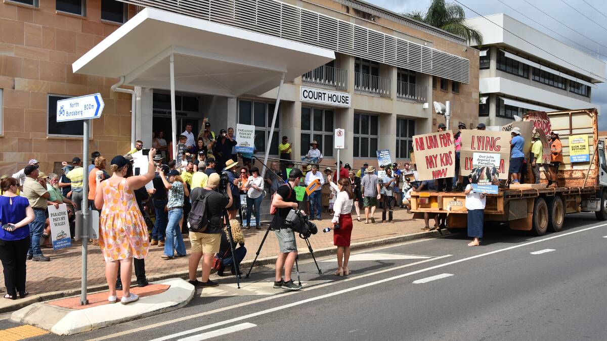 ATTENTION: Local media cover the Paradise Dam protest outside the Bundaberg Courthouse. 