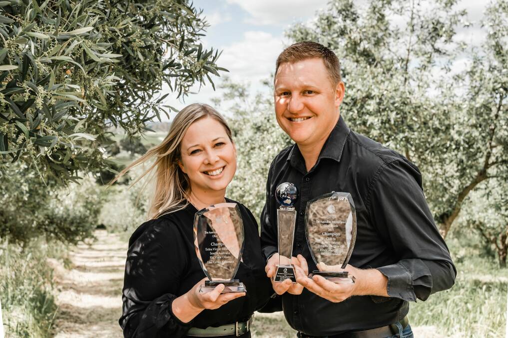 TOP: Jared and Jacqueline Bettio, Rio Vista Olives, Glynde with some of their trophies from the recent 2021 Australian International Olive Awards. 