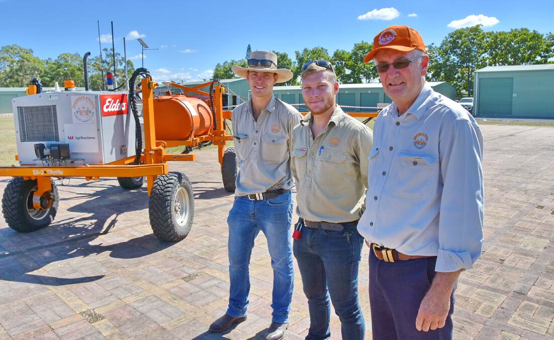 BOT BLOKES: The team from Swarm Farm, Tom Holcombe, Emerald, Qld, Dustin van Nek, Emerald, Qld and Neville Crook, Emerald, Qld in front of the autonomous field robot, the SwarmBot.