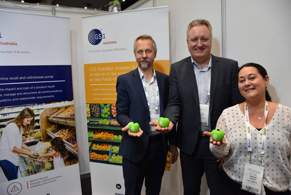 BENEFITS: GS1 Australia staff John Szabo, Andrew Steele and Melanie Wishart at Hort Connections 2019 in Melbourne, showing industry experts the benefits of the GS1 Australia Recall portal for better recalls and GS1 DataBar for accurately scanning loose fruit and vegetables. 