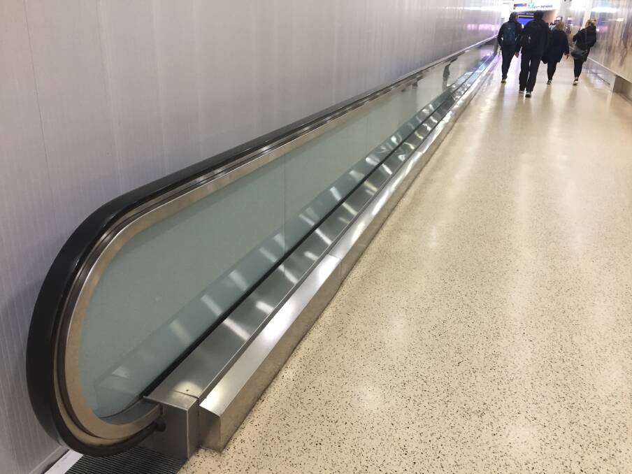 HOLD ON: Auckland Airport may be suffering budget cuts, with travellers forced to use what's known as a "manual travelator". 