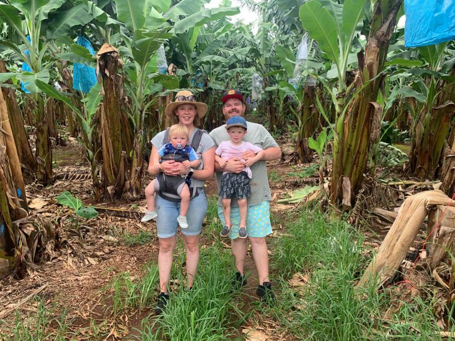 Simon Herald and family take in a visit to a banana plantation to get versed-up on how the plant grows. Picture supplied