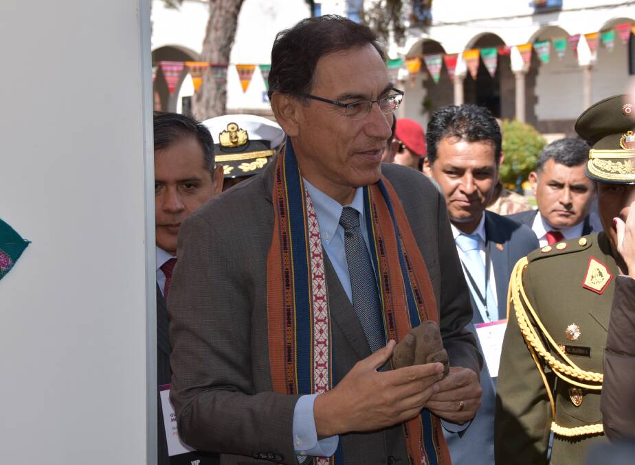 TOP SPUD: President of Peru, Martin Vizcarra gets up close with a native potato on his visit to the World Potato Congress in Cusco. 