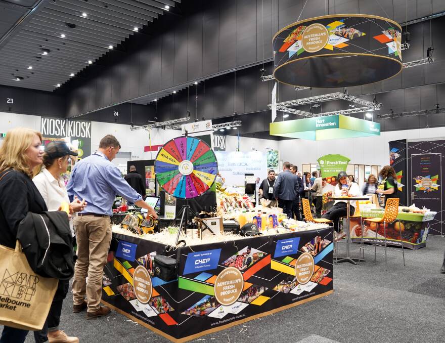 WINNING: Part of the Fresh Markets Australia and Central Markets Association of Australia display included a spinning wheel for prize giveaways. 