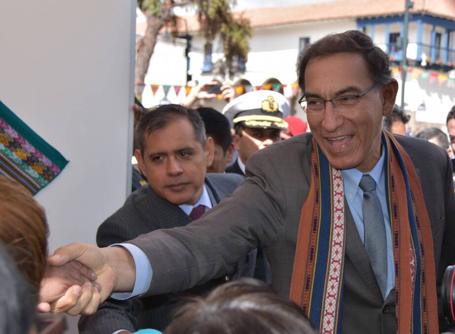 PEOPLE PERSON: Peruvian president, Martin Vizcarra, takes time to meet the people outside the 10th World Potato Congress in Peru. 