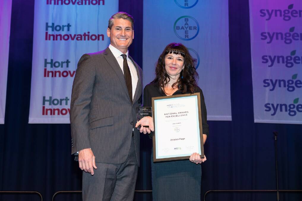 WINNER: Bayer head of customer marketing - crop science division, Grant Styn, presenting the Researcher of the Year award to Jessica Page at Hort Connections 2018. 